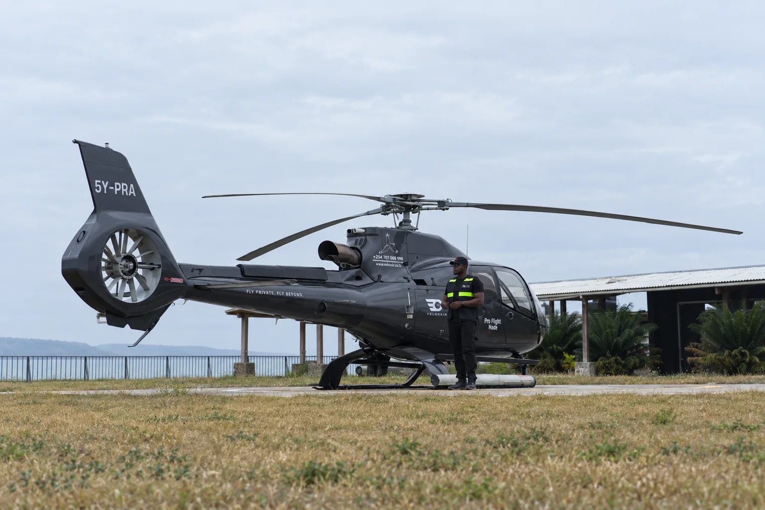 Veloxair Airbus EC130 B4 helicopter on the ground in Tanzania
